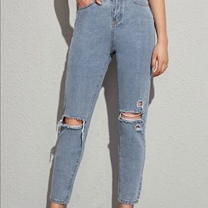mom jeans ripped at the knees